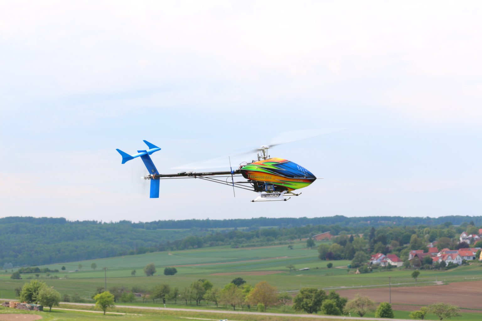 flight test of a UAV helicopter with active stabilizer assembly; autonomous helicopter